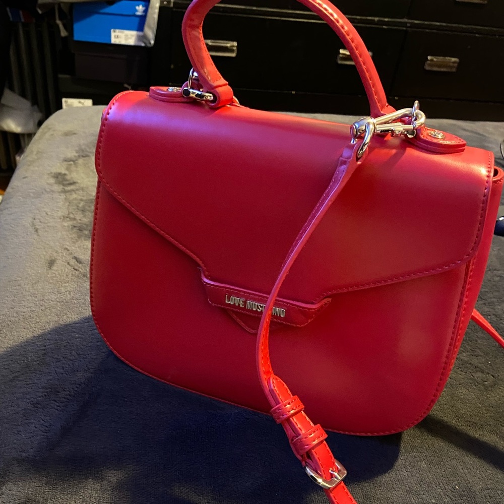 Love moschino red bag. Can be worn multiple ways!